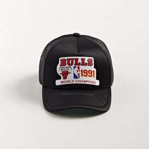 Front view of Chicago Bulls Champions Trucker Hat with vibrant vintage-inspired screen print and foam front panel.