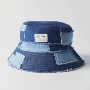 Navy blue frayed patchwork bucket hat made from cotton canvas