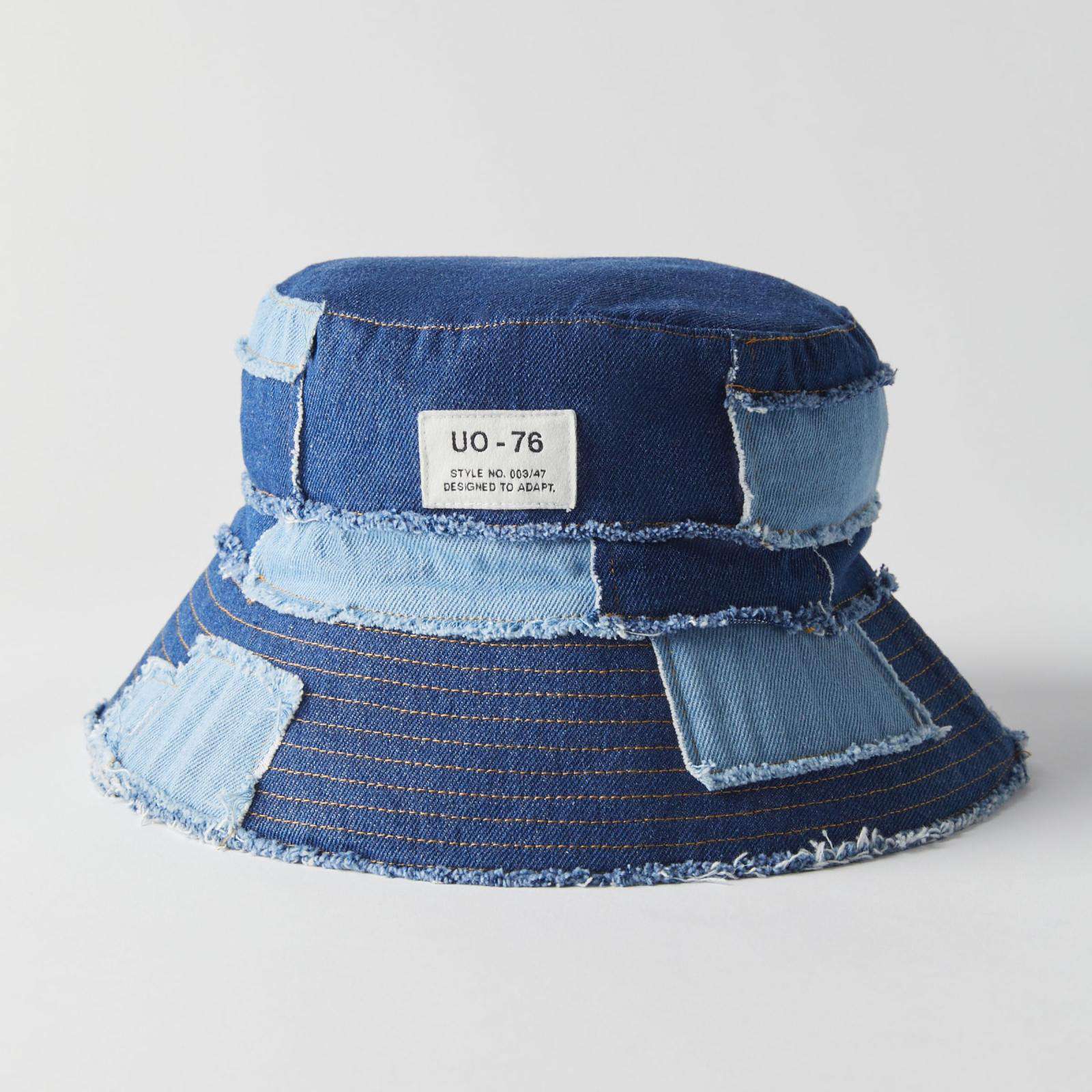 Navy blue frayed patchwork bucket hat made from cotton canvas