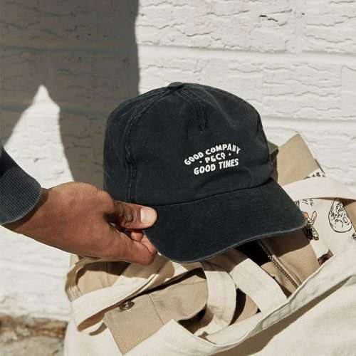 Washed 5 panel hats in multiple colorways displayed together, custom cotton twill caps.