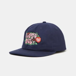 Angled front view of an unstructured navy blue cotton twill 6-panel cut-and-sew dad hat featuring a flat brim and vibrant high-density multi-color graffiti embroidery.